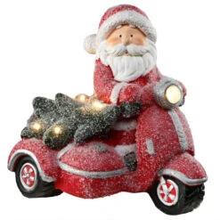 14" Red And White Lighted Santa On Scooter Christmas Tabletop Figurine