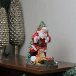 Roman 8.75" Tiptoeing Santa With Smiling Dog Christmas Tabletop Figurine 7 Roman 8.75" Tiptoeing Santa With Smiling Dog Christmas Tabletop Figurine -Ornaments Store roman20131654 3 42171.1587644956